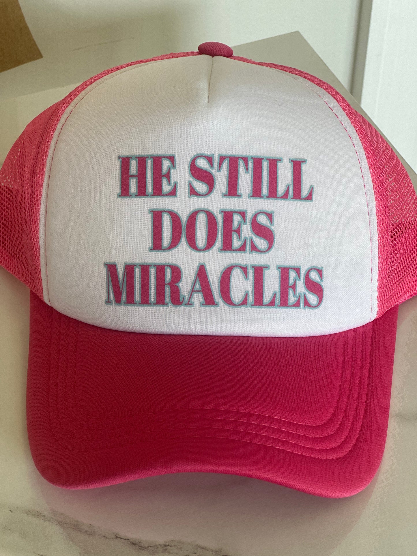 He Still Does Miracles trucker Hat