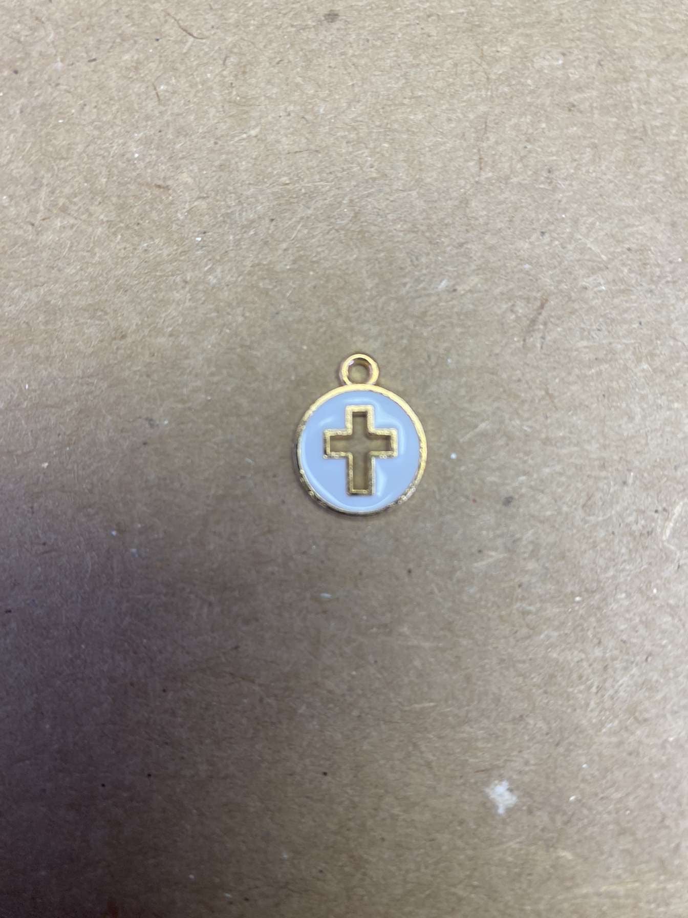 White cross pendant