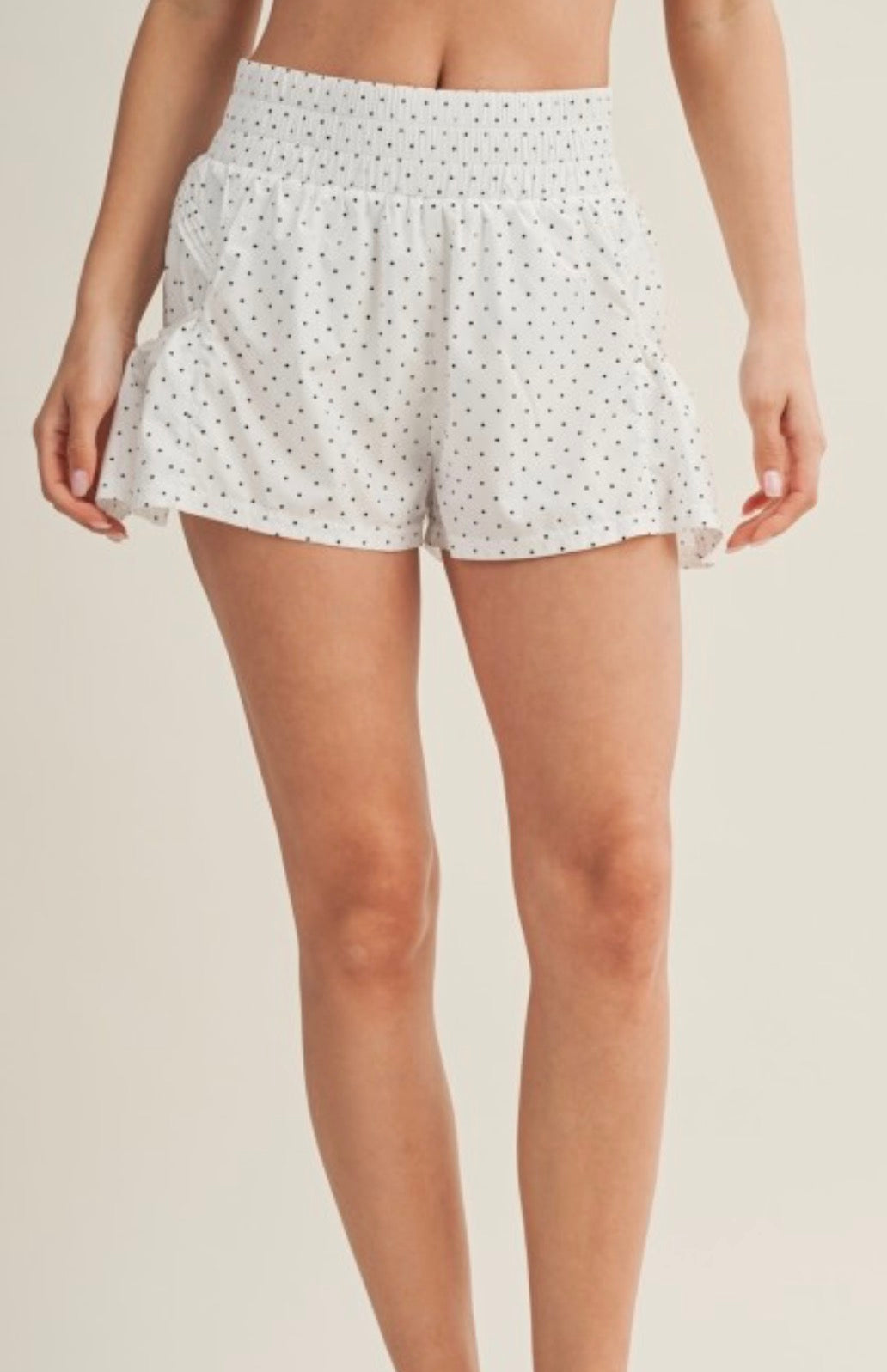 White and black polka dot side flare athletic shorts