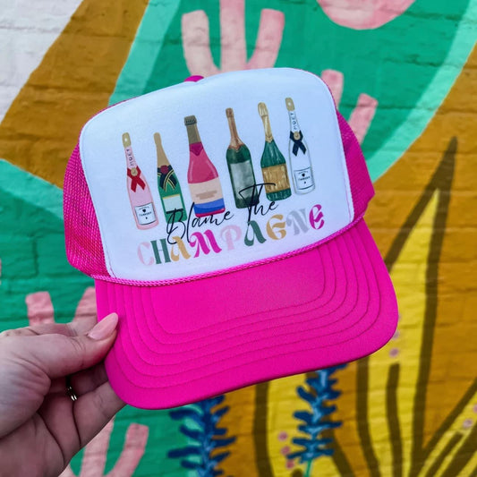 Blame The Champagne Trucker Hat